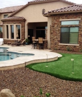 This Beautiful Putting Green, Travertine Pool Deck And Ston Veneer Walls Were Installed By Centurion Stone Of Arizona