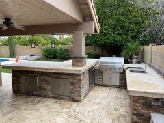 backyard with centurion stone BBQ design