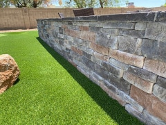 Cutface Kentucky Retaining wall & Bermuda Grass